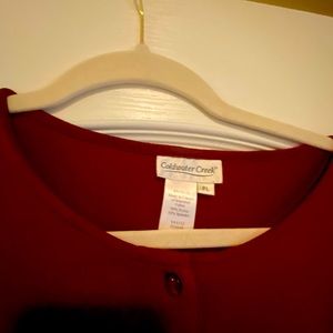 Coldwater Creek burgundy blouse.Perfect for the holidays. 90% Nylon/10% Spandex.